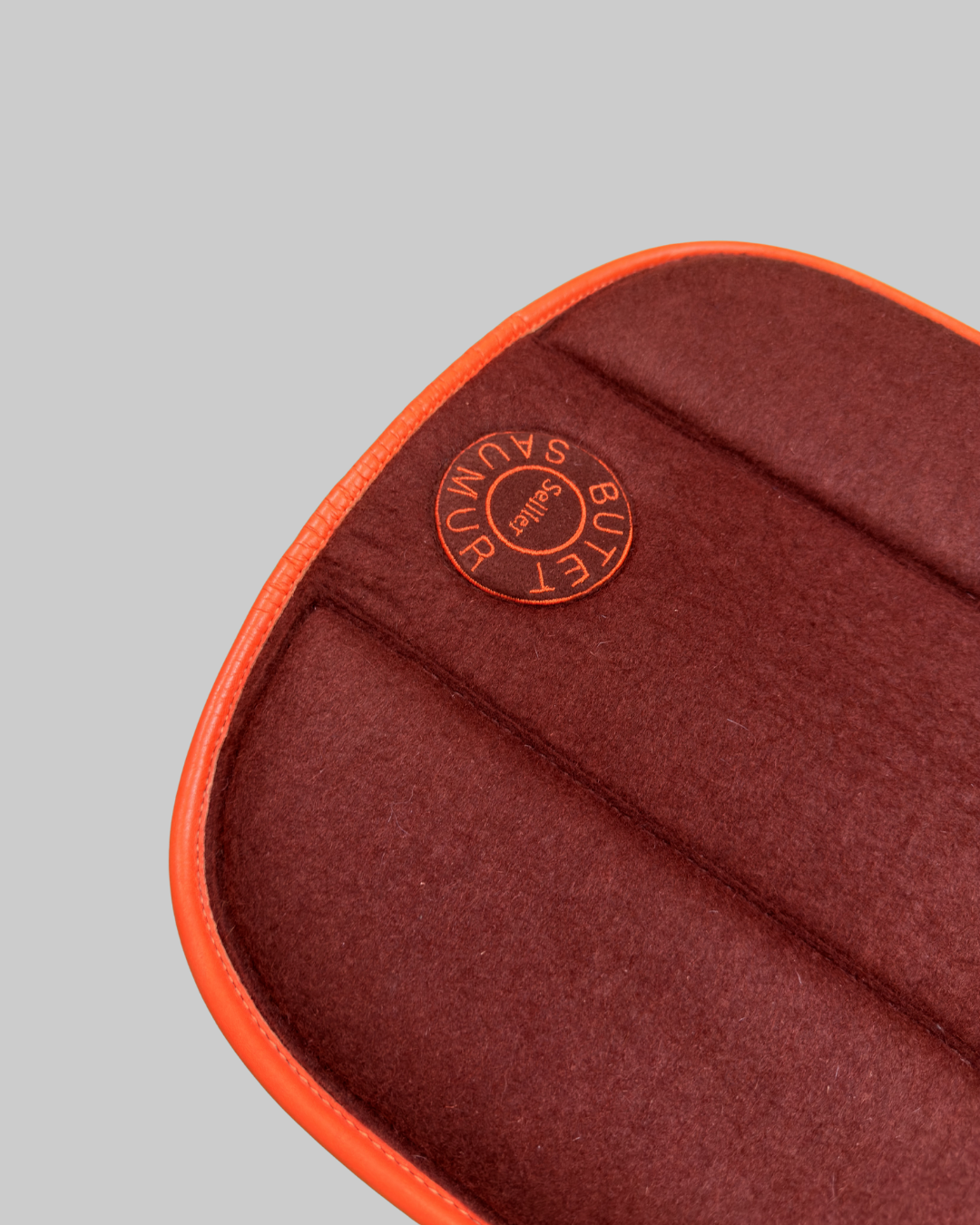 Butet Saumur Saddle Pad B Brown Felt Orange Calfskin Trim